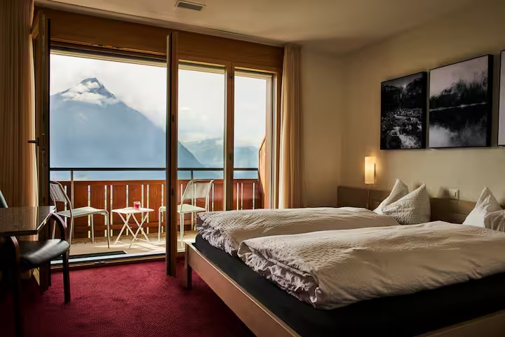 Peaceful Retreat Hotel Room with Balcony & Lake Thun Views