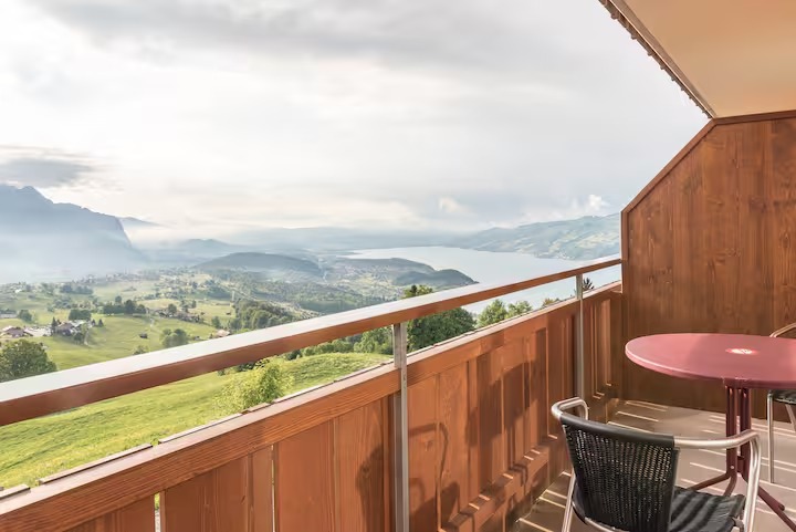Peaceful Retreat Hotel Room with Balcony & Lake Thun Views